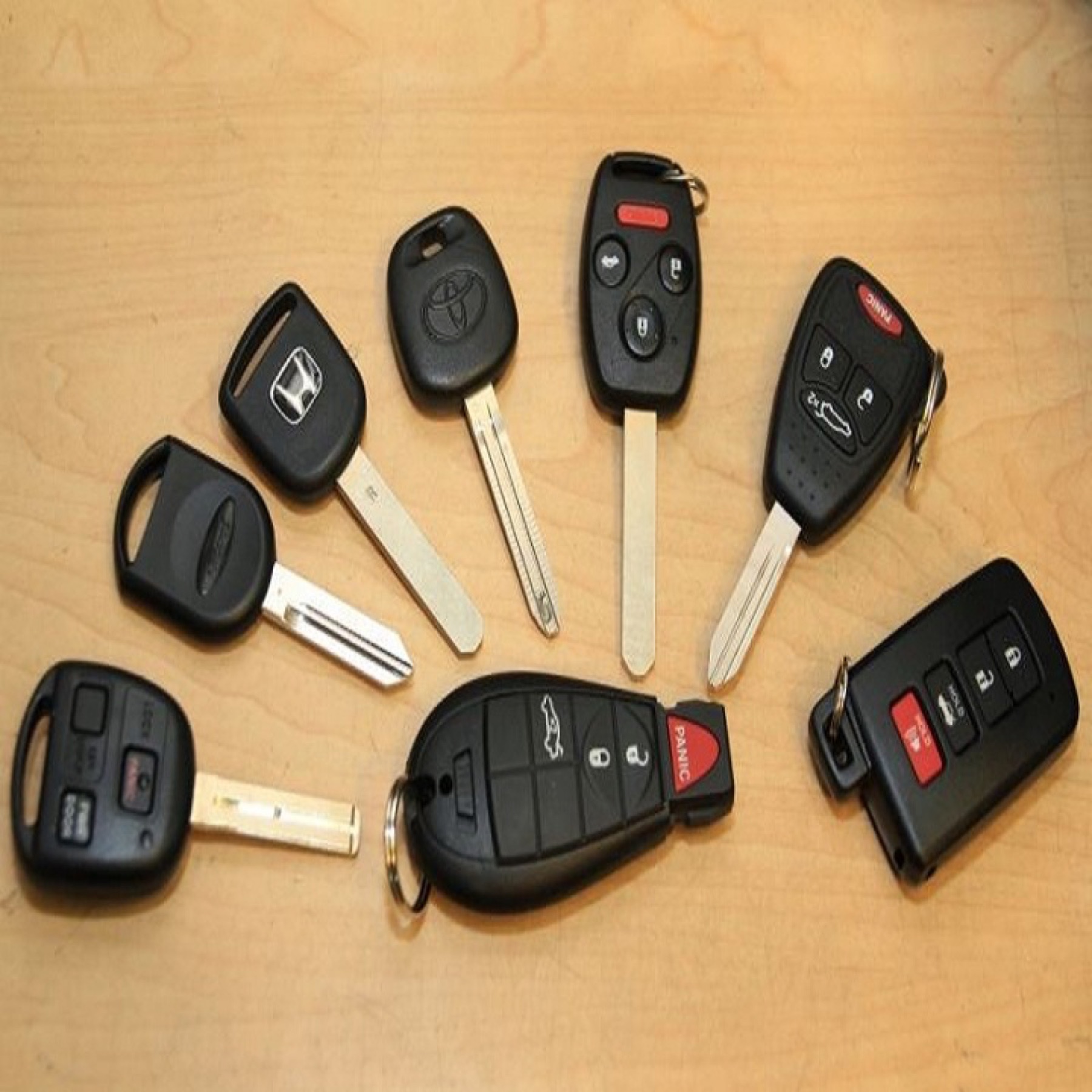 Assorted automotive keys and remotes