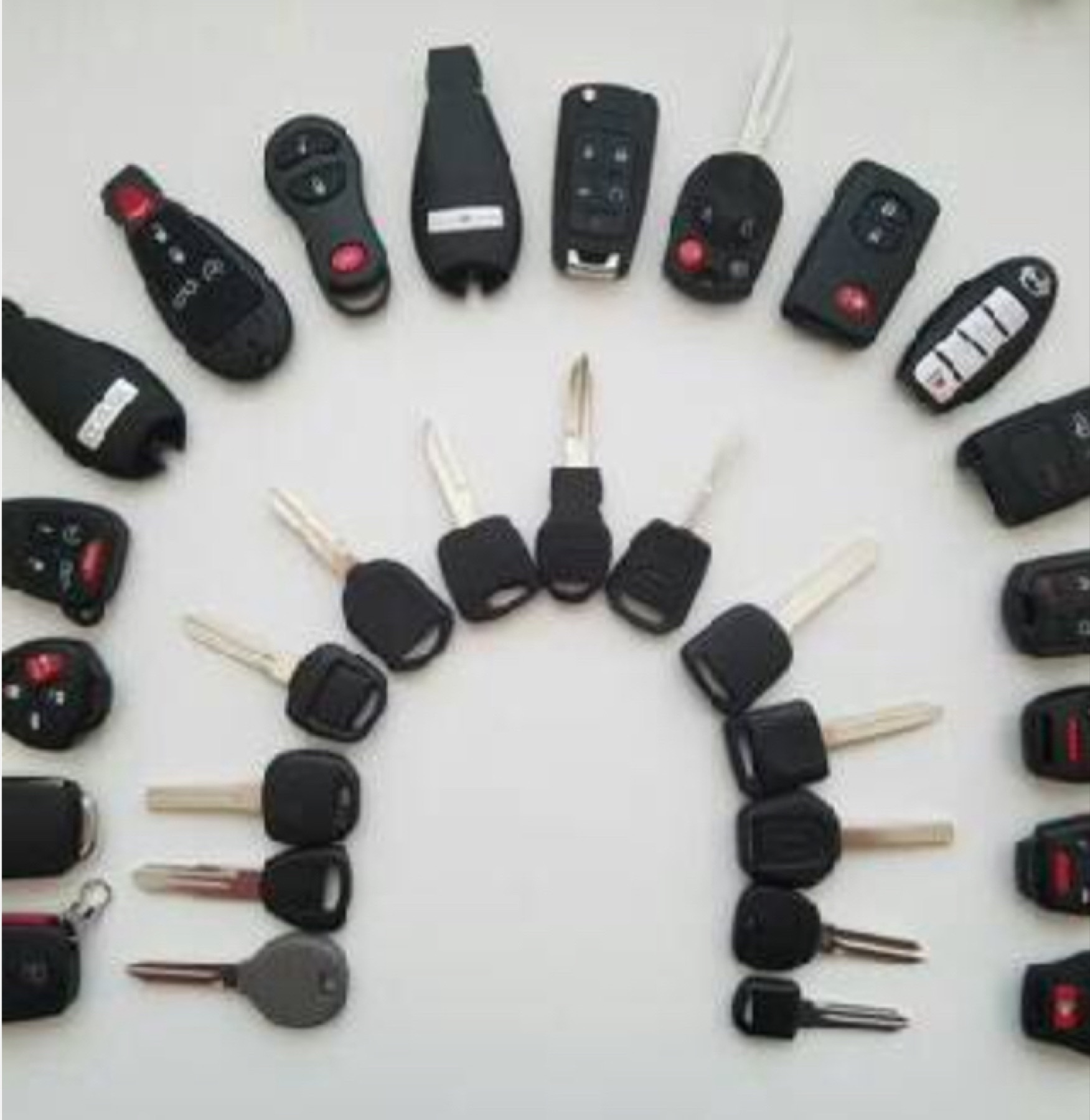 Assorted automotive remotes and key fobs